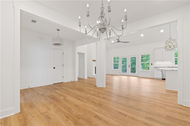 102-A S Cay Dr, Milledgeville, GA 31061 - unfurnished living room featuring a chandelier, light wood-type flooring, recessed lighting, and baseboards