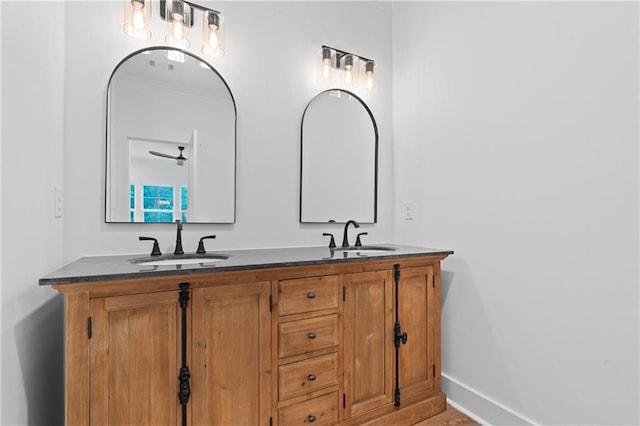 102-A S Cay Dr, Milledgeville, GA 31061 - bathroom featuring double vanity and baseboards