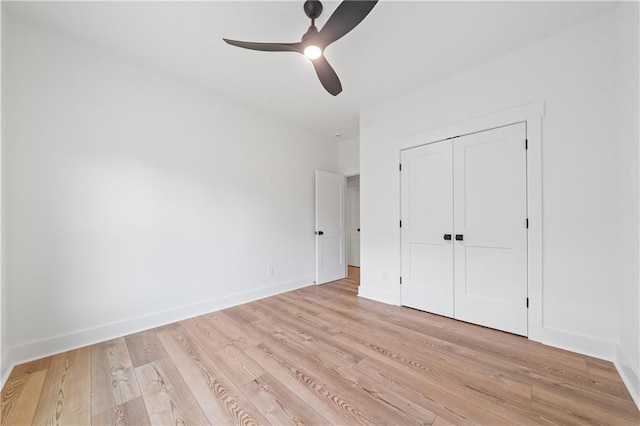 102-A S Cay Dr, Milledgeville, GA 31061 - unfurnished bedroom with light wood-style flooring, baseboards, a closet, and a ceiling fan