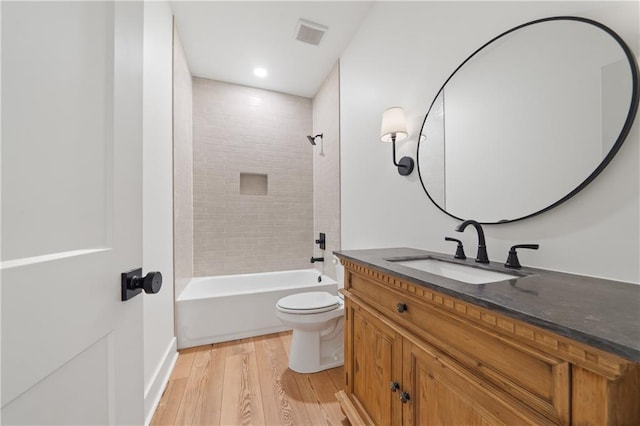 102-A S Cay Dr, Milledgeville, GA 31061 - full bathroom featuring vanity, toilet, wood finished floors, bathing tub / shower combination, and recessed lighting