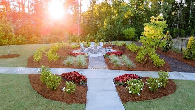 1139 Blue Juniper Cir, Loganville, GA 30052 - exterior space featuring an outdoor fire pit and a patio