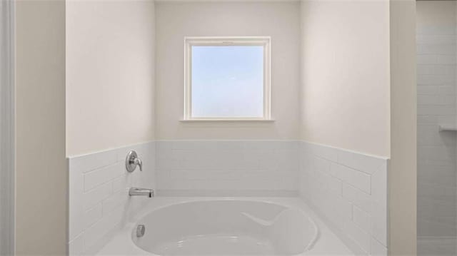 1139 Blue Juniper Cir, Loganville, GA 30052 - bathroom with a bath
