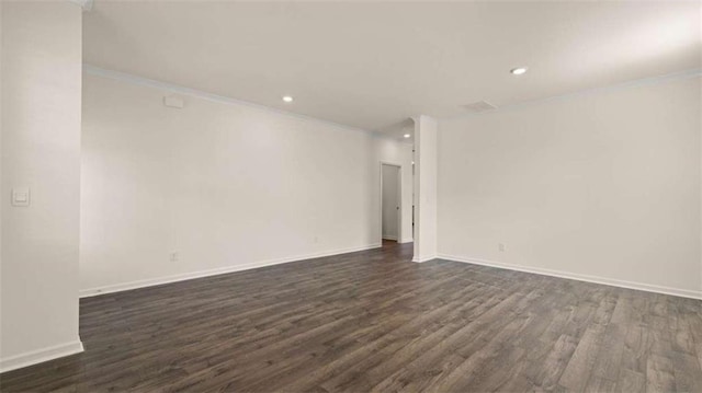1139 Blue Juniper Cir, Loganville, GA 30052 - empty room featuring ornamental molding, baseboards, recessed lighting, and dark wood finished floors