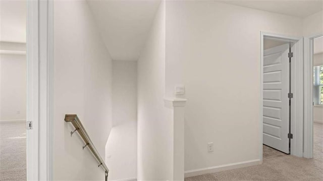 1139 Blue Juniper Cir, Loganville, GA 30052 - stairway with baseboards and carpet floors