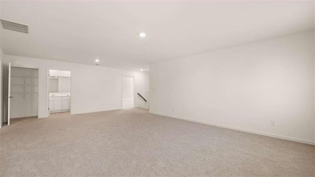 1139 Blue Juniper Cir, Loganville, GA 30052 - interior space featuring light carpet, recessed lighting, visible vents, and baseboards