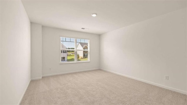 1139 Blue Juniper Cir, Loganville, GA 30052 - carpeted spare room featuring baseboards