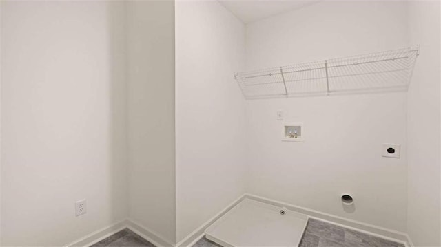 1139 Blue Juniper Cir, Loganville, GA 30052 - washroom with laundry area, hookup for an electric dryer, washer hookup, hookup for a gas dryer, and baseboards