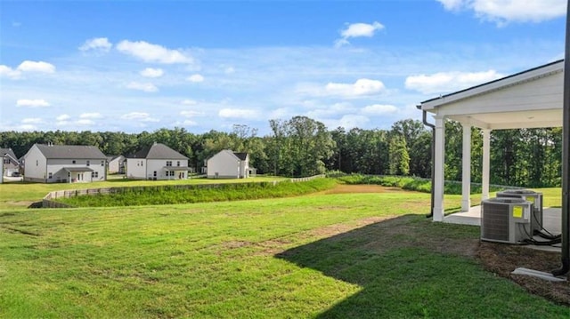 1139 Blue Juniper Cir, Loganville, GA 30052 - view of yard featuring central AC unit
