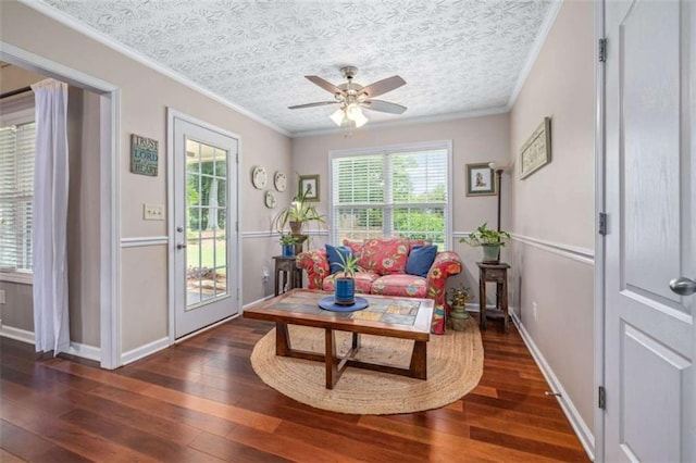 42 Hummingbird Ct, Jefferson, GA 30549 - living area with hardwood / wood-style floors, ceiling fan, baseboards, and ornamental molding
