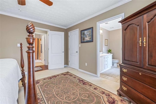 42 Hummingbird Ct, Jefferson, GA 30549 - bedroom with a sink, ensuite bathroom, baseboards, ornamental molding, and light carpet