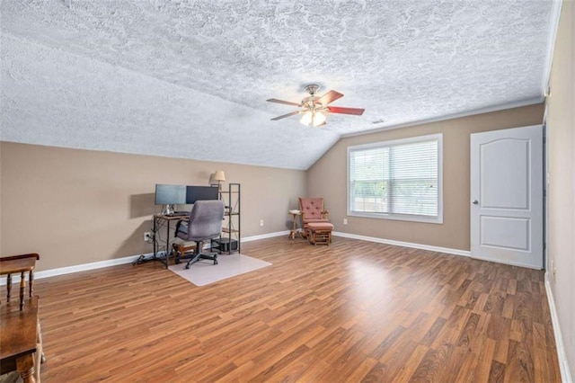 42 Hummingbird Ct, Jefferson, GA 30549 - office area featuring a textured ceiling, wood finished floors, a ceiling fan, baseboards, and lofted ceiling
