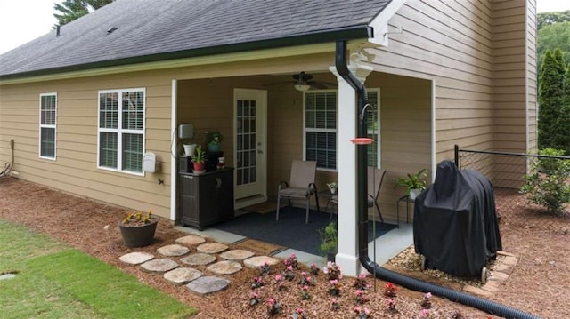 42 Hummingbird Ct, Jefferson, GA 30549 - rear view of property featuring a ceiling fan, fence, a patio area, and roof with shingles