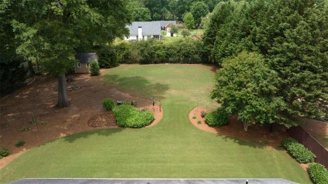 42 Hummingbird Ct, Jefferson, GA 30549 - view of grassy yard with a shed and an outdoor structure
