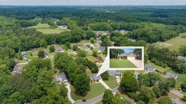 42 Hummingbird Ct, Jefferson, GA 30549 - aerial view of residential area with a forest