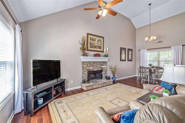 42 Hummingbird Ct, Jefferson, GA 30549 - living area featuring high vaulted ceiling, a chandelier, baseboards, wood finished floors, and ceiling fan