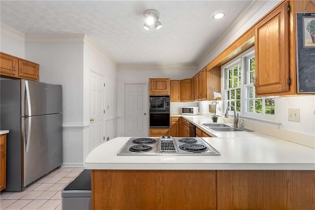 1950 Wenlok Trl NE, Marietta, GA 30066 - kitchen with black appliances, light countertops, and brown cabinetry
