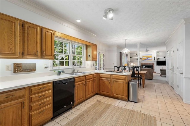 1950 Wenlok Trl NE, Marietta, GA 30066 - kitchen with black dishwasher, light tile patterned flooring, a peninsula, light countertops, and ornamental molding