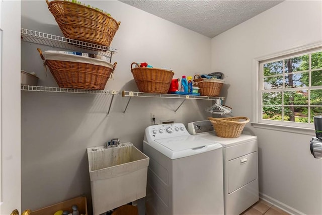1950 Wenlok Trl NE, Marietta, GA 30066 - laundry area with washing machine and clothes dryer and light tile patterned floors