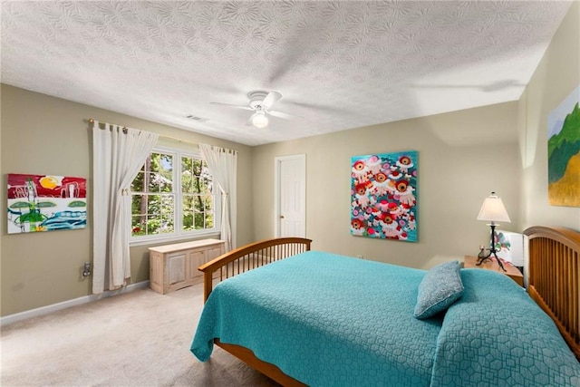 1950 Wenlok Trl NE, Marietta, GA 30066 - bedroom with light colored carpet, ceiling fan, and a textured ceiling
