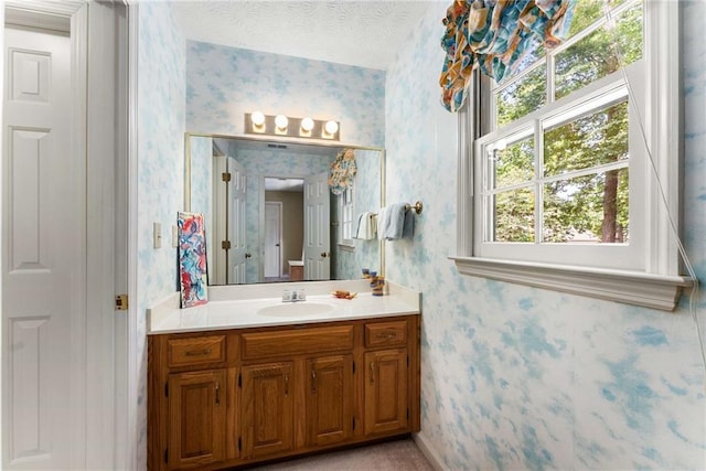 1950 Wenlok Trl NE, Marietta, GA 30066 - bathroom with wallpapered walls and vanity
