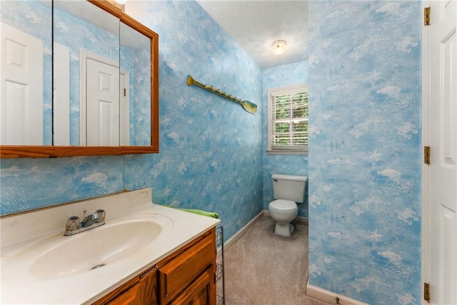 1950 Wenlok Trl NE, Marietta, GA 30066 - bathroom with vanity, wallpapered walls, and a textured ceiling