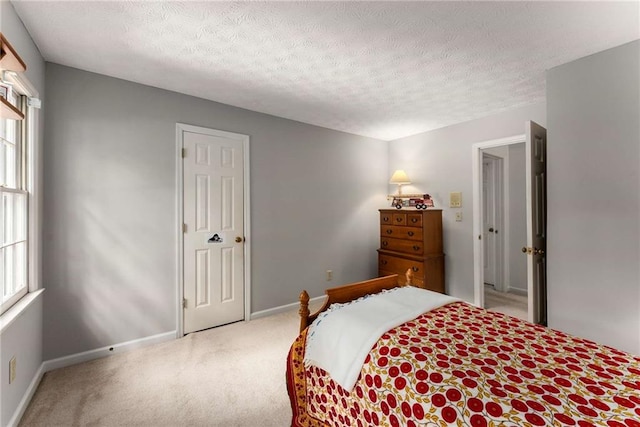 1950 Wenlok Trl NE, Marietta, GA 30066 - bedroom with carpet floors, multiple windows, and a textured ceiling