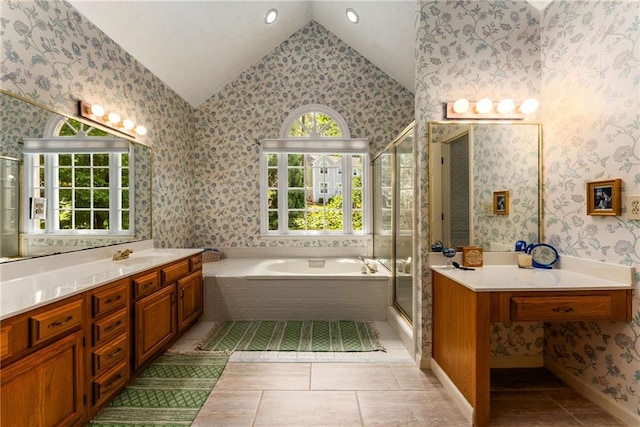 1950 Wenlok Trl NE, Marietta, GA 30066 - bathroom with lofted ceiling, a bath, vanity, a shower stall, and wallpapered walls