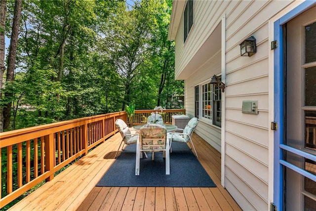 1950 Wenlok Trl NE, Marietta, GA 30066 - deck featuring outdoor dining area and view of scattered trees
