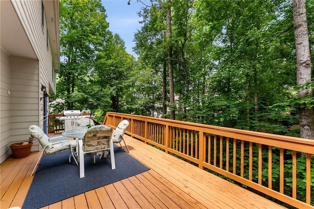 1950 Wenlok Trl NE, Marietta, GA 30066 - wooden terrace with outdoor dining area and view of scattered trees
