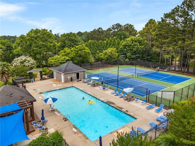 1950 Wenlok Trl NE, Marietta, GA 30066 - community pool with a patio, a tennis court, and a wooded view