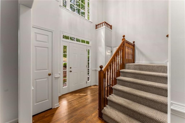 1950 Wenlok Trl NE, Marietta, GA 30066 - entryway featuring stairway, wood finished floors, and a high ceiling