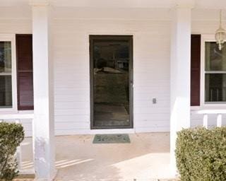 566 Sugar Valley Ln, Conyers, GA 30094 - property entrance with a porch
