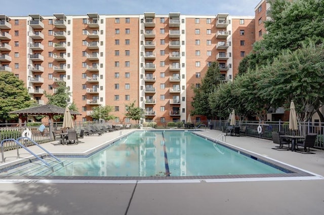 view of pool featuring a gazebo and a patio area