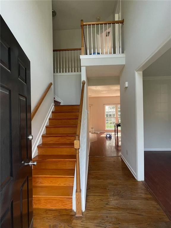 2994 Abbotts Oak Way, Duluth, GA 30097 - staircase featuring wood finished floors and baseboards