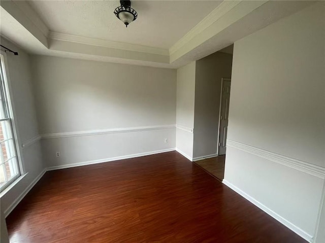 2994 Abbotts Oak Way, Duluth, GA 30097 - spare room with wood finished floors, ornamental molding, and a raised ceiling