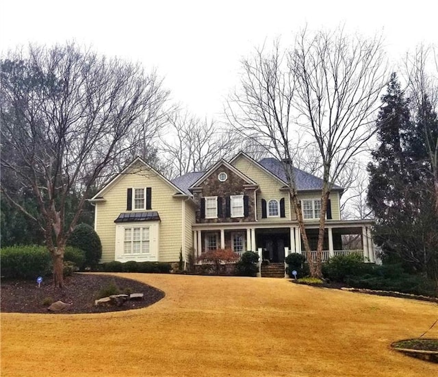 view of front property featuring a porch