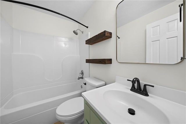 bathroom featuring toilet, vanity, and washtub / shower combination