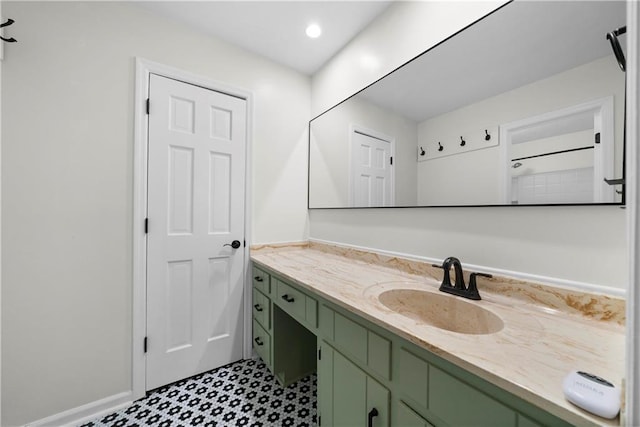 bathroom featuring tile patterned floors, vanity, and recessed lighting