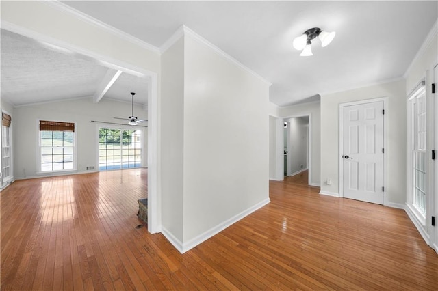 hallway featuring wood-type flooring, crown molding, and vaulted ceiling with beams