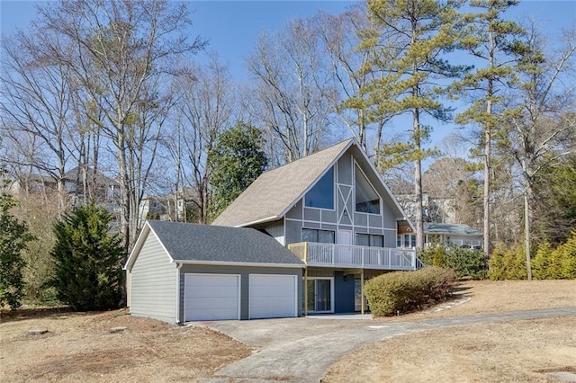 view of front of house featuring a balcony and a garage