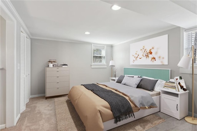 bedroom with baseboards, multiple windows, and ornamental molding