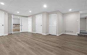 interior space with recessed lighting, baseboards, and wood finished floors