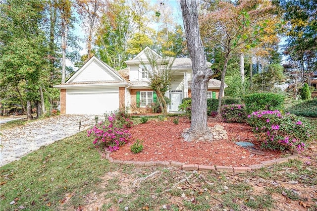 view of front of property with a garage