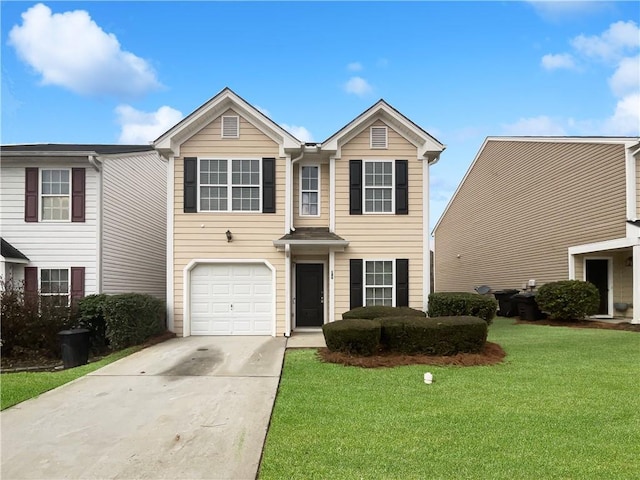 traditional-style home with a front yard, concrete driveway, and an attached garage