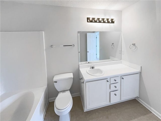 full bathroom with baseboards, vanity, toilet, and a textured ceiling