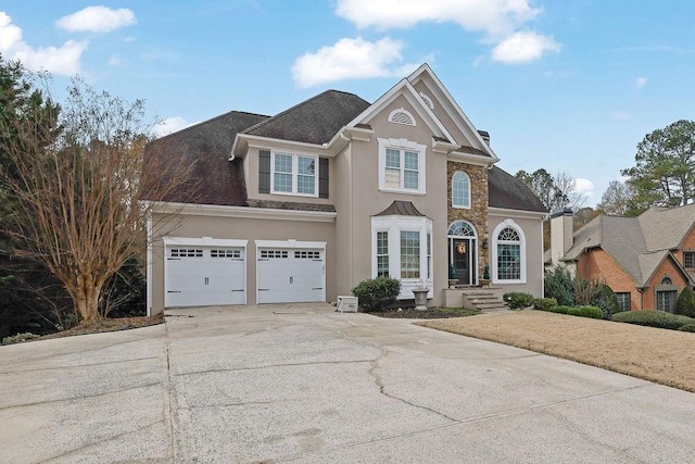 view of front of home with a garage