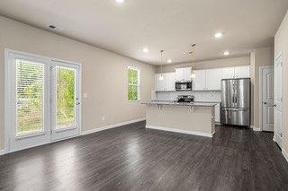 kitchen featuring white cabinets, recessed lighting, appliances with stainless steel finishes, and dark wood finished floors