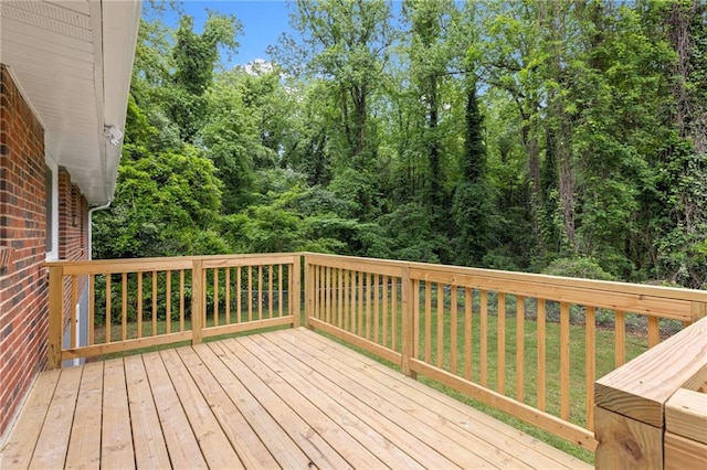 deck featuring a yard