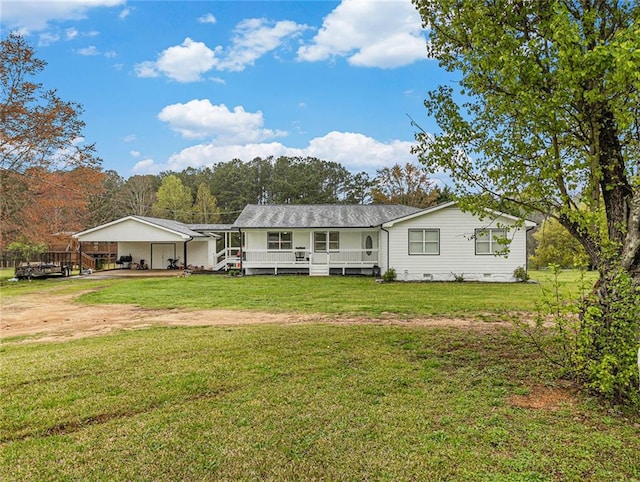 back of house with a yard