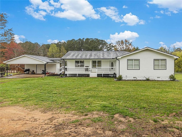 rear view of house with a yard